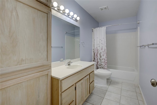 full bathroom featuring tile patterned flooring, shower / bath combination with curtain, vanity, and toilet