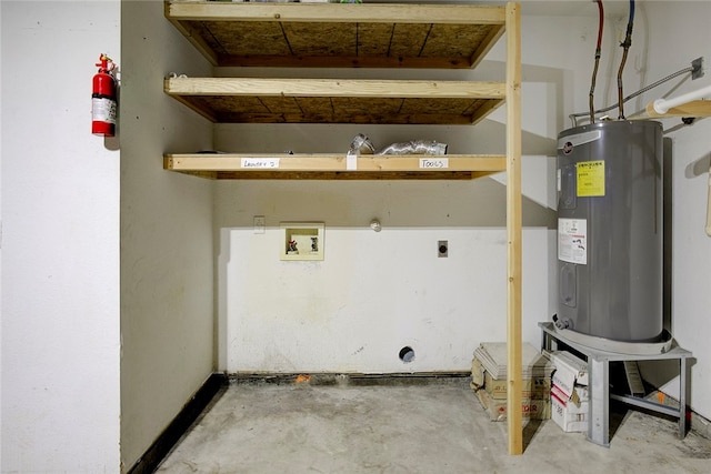 laundry area with hookup for a washing machine, electric water heater, and electric dryer hookup