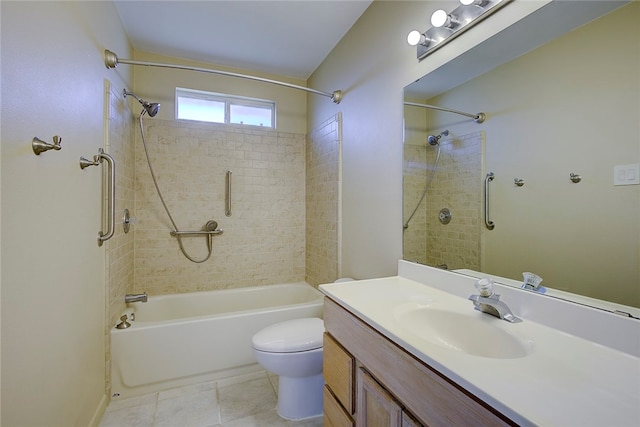 full bathroom with tile patterned floors, vanity, toilet, and tiled shower / bath