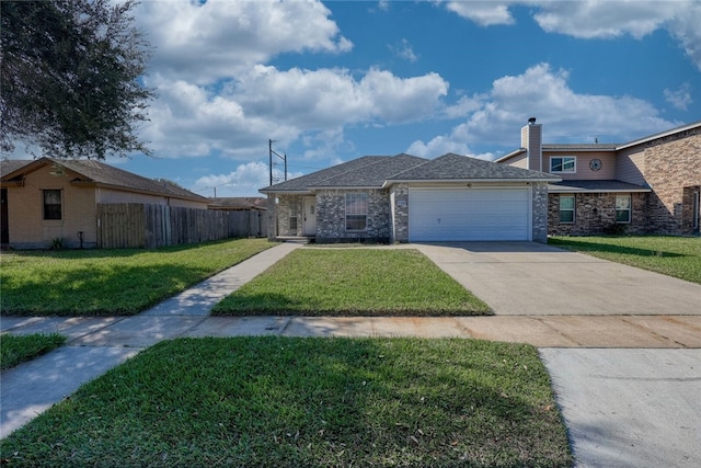 view of front facade featuring a garage and a front lawn