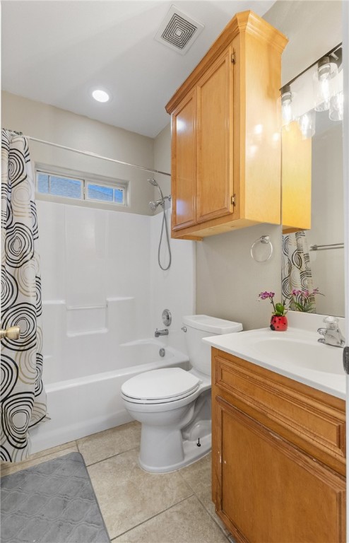 3613 Berkeley Dr, Corpus Christi, TX 78414 - full bathroom featuring vanity, shower / tub combo, and tile patterned flooring