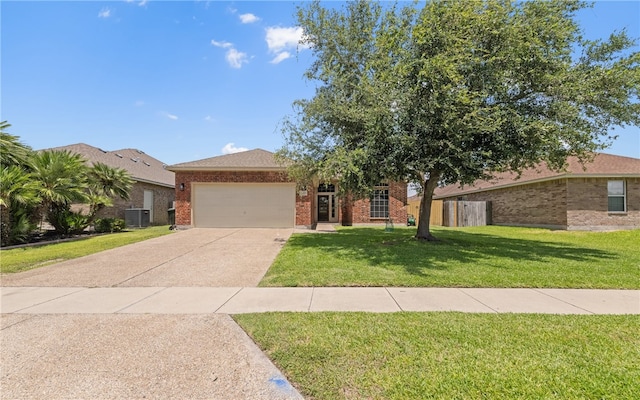 3613 Berkeley Dr, Corpus Christi, TX 78414 - view of front facade with an attached garage, driveway, and brick siding