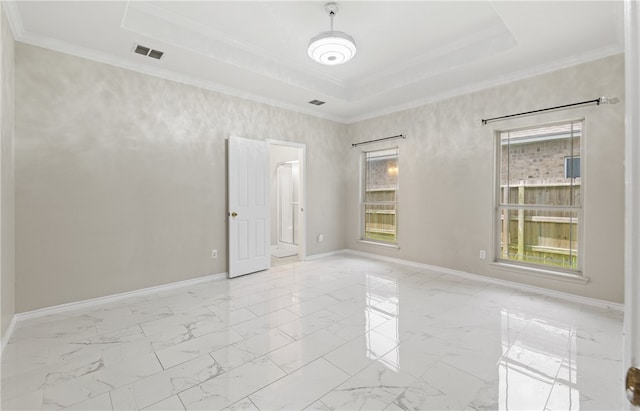 3613 Berkeley Dr, Corpus Christi, TX 78414 - unfurnished room with crown molding, a tray ceiling, and light marble finish floors