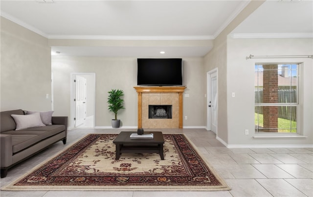 3613 Berkeley Dr, Corpus Christi, TX 78414 - living room featuring crown molding, plenty of natural light, tile patterned flooring, and a tile fireplace