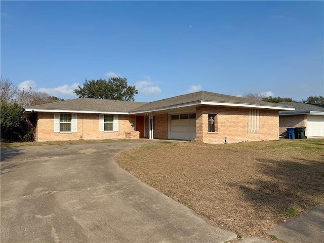 ranch-style house featuring a garage