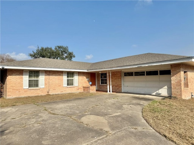 single story home with a garage