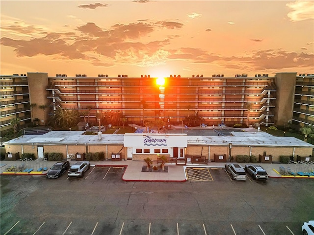 view of outdoor building at dusk