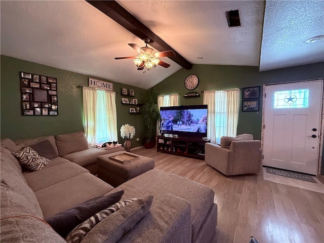 5742 Hidden Valley Loop, Sandia, TX 78383 - living room featuring wood finished floors, a ceiling fan, and a textured ceiling