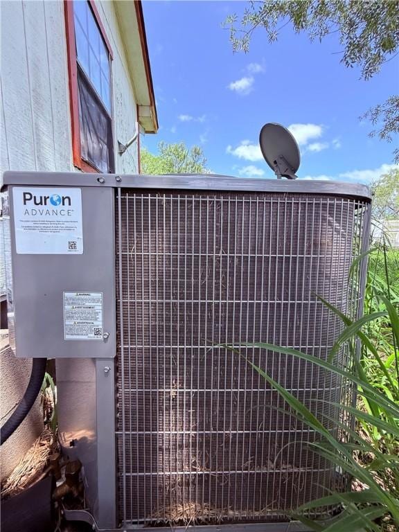 5742 Hidden Valley Loop, Sandia, TX 78383 - exterior view of a cooling unit and a satellite dish