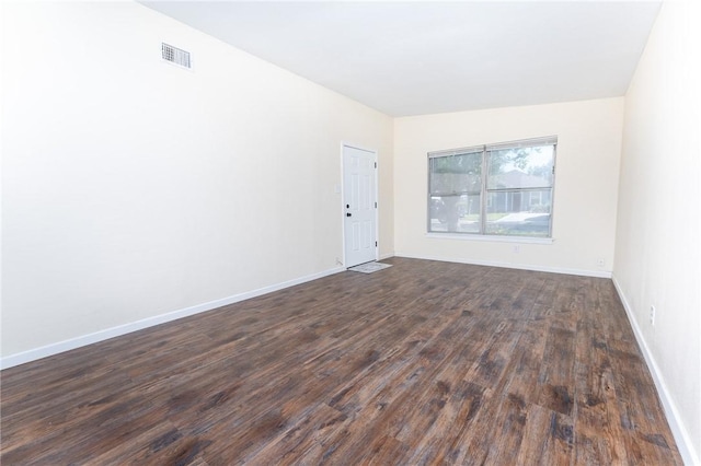 3606 Marion St, Corpus Christi, TX 78415 - spare room with dark wood-style flooring and baseboards