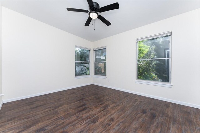 3606 Marion St, Corpus Christi, TX 78415 - spare room featuring dark wood-style flooring and ceiling fan