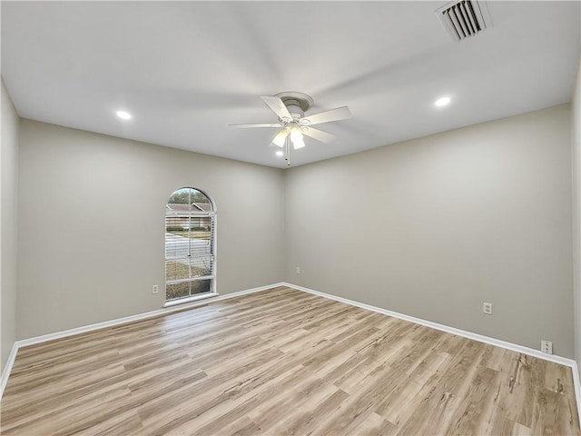 unfurnished room with ceiling fan, recessed lighting, visible vents, baseboards, and light wood-type flooring