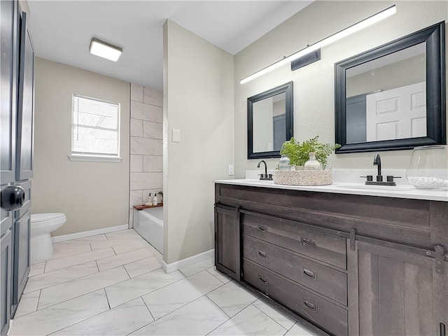 full bathroom featuring double vanity, toilet, marble finish floor, a washtub, and a sink