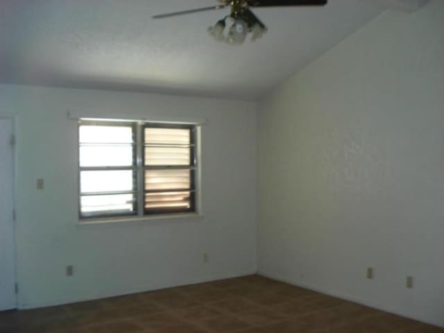 unfurnished room with ceiling fan