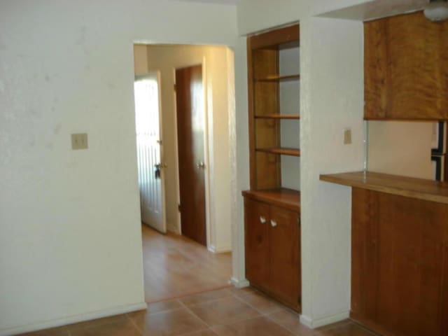 interior space with light tile patterned flooring