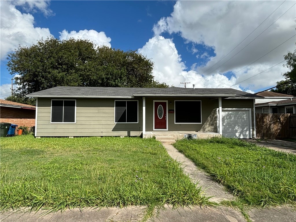 4801 Andover Dr, Corpus Christi, TX 78411 - ranch-style house featuring an attached garage