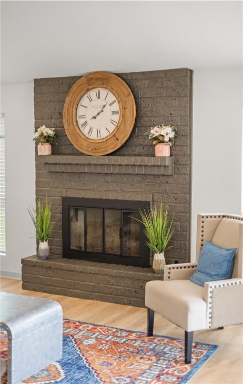 6905 Braesvalley Dr, Corpus Christi, TX 78413 - sitting room with a fireplace and wood finished floors