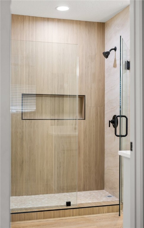 6905 Braesvalley Dr, Corpus Christi, TX 78413 - full bath featuring a shower stall