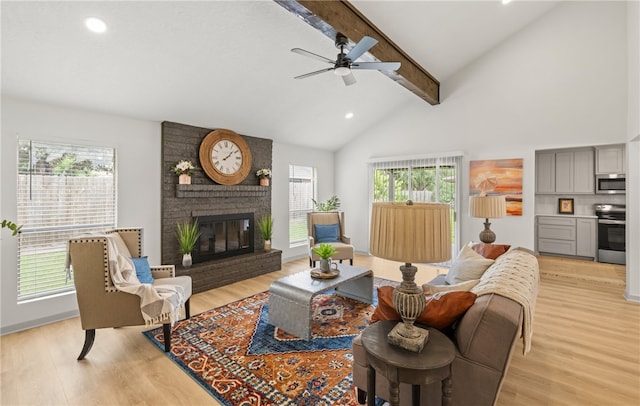 6905 Braesvalley Dr, Corpus Christi, TX 78413 - living area featuring beam ceiling, light wood-type flooring, a brick fireplace, a ceiling fan, and recessed lighting