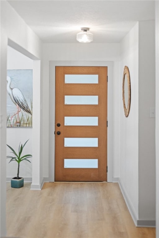 6905 Braesvalley Dr, Corpus Christi, TX 78413 - entryway featuring light wood-style flooring and baseboards