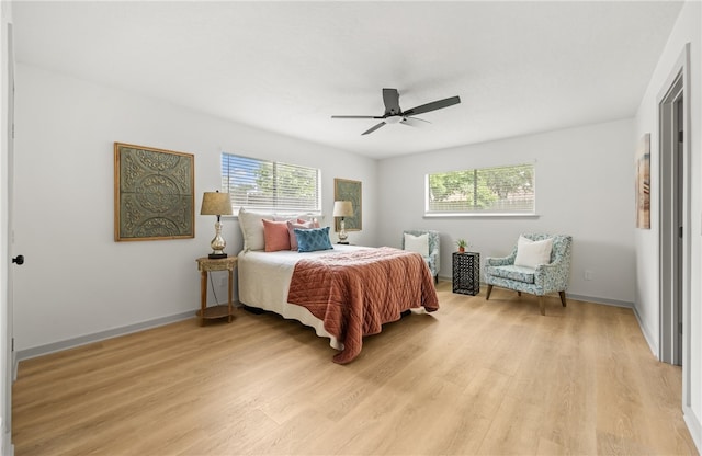 6905 Braesvalley Dr, Corpus Christi, TX 78413 - bedroom with light wood finished floors and ceiling fan
