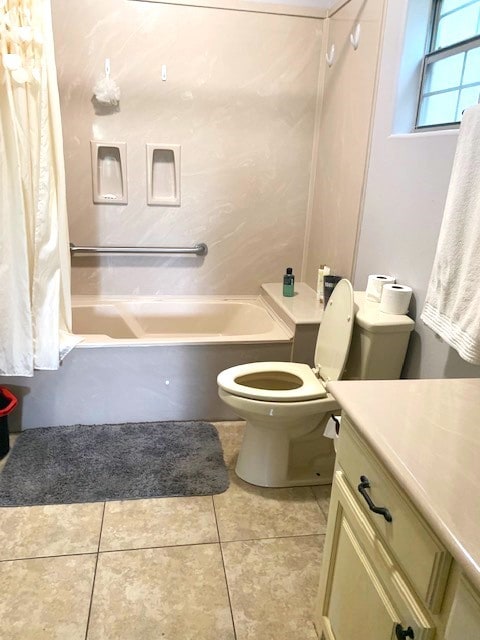 full bathroom with toilet, vanity, tile patterned floors, and shower / tub combo with curtain