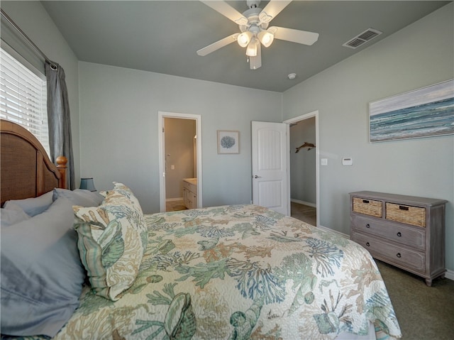 carpeted bedroom featuring ensuite bathroom and ceiling fan