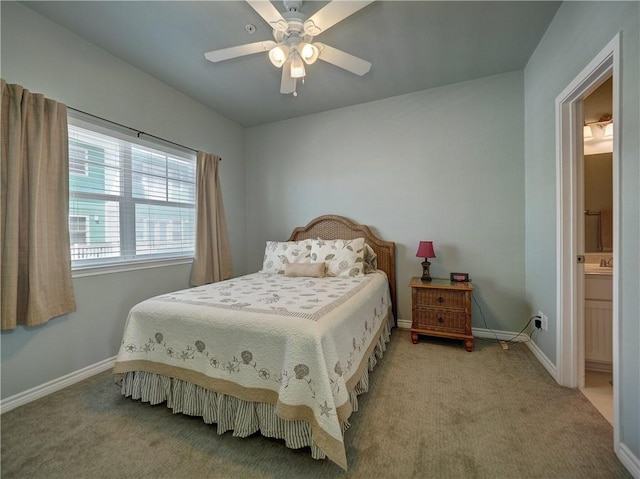 carpeted bedroom with baseboards and a ceiling fan