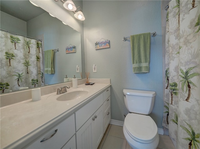 bathroom with vanity, curtained shower, tile patterned floors, and toilet