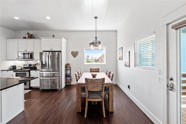 dining area with baseboards, an inviting chandelier, ornamental molding, dark wood-style floors, and recessed lighting