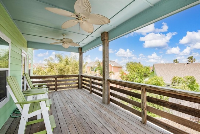 wooden deck with ceiling fan