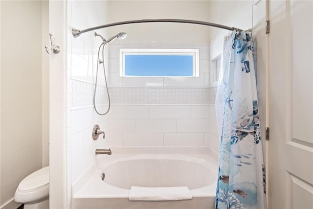 full bath with toilet and shower / tub combo with curtain