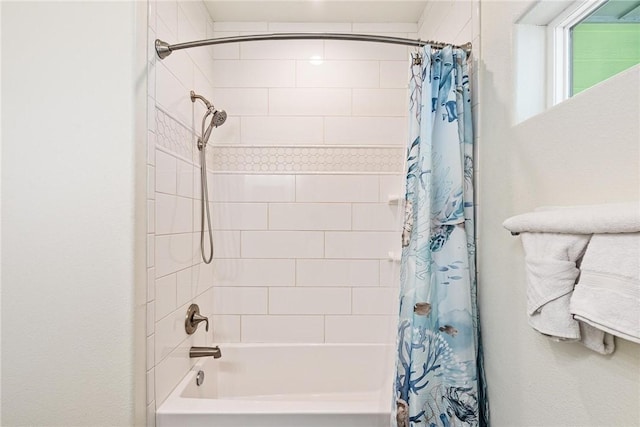 full bathroom with shower / tub combo
