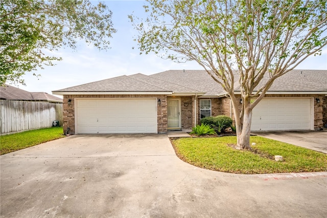 ranch-style home with a garage