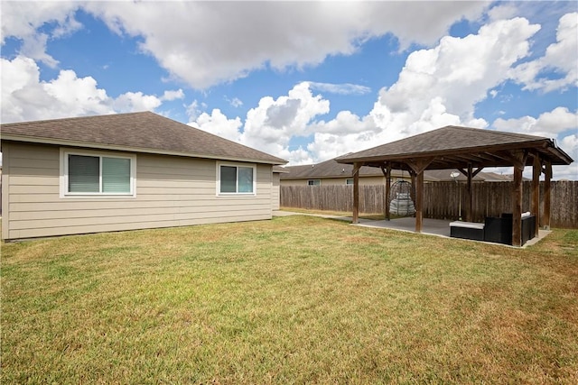 view of yard with a gazebo, an outdoor hangout area, and a patio area