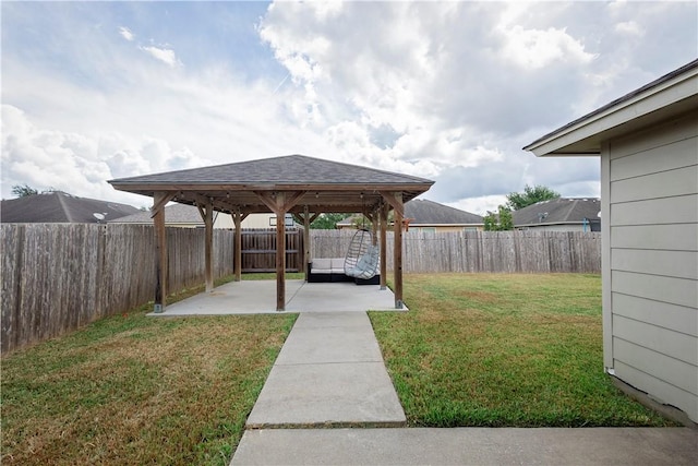 view of yard with a gazebo and a patio