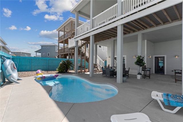 view of pool featuring a patio area