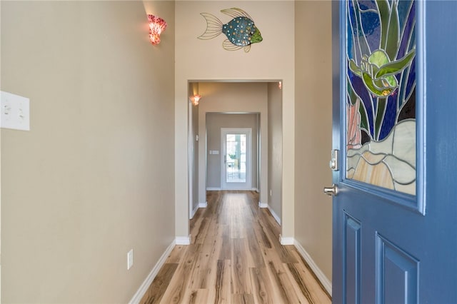 entryway with light hardwood / wood-style flooring