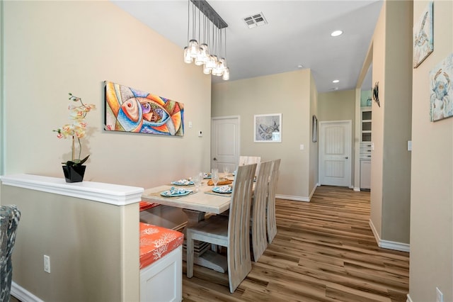 dining space with light wood-type flooring