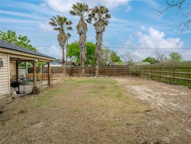 view of yard featuring a fenced backyard