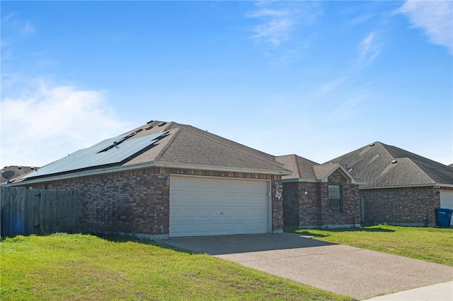 ranch-style home featuring concrete driveway, an attached garage, fence, a front lawn, and brick siding