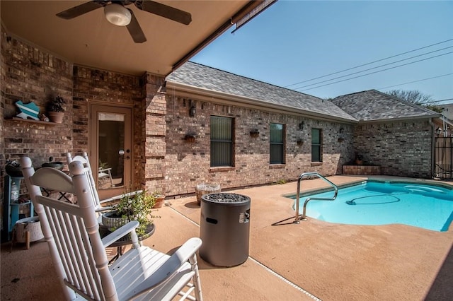 view of pool featuring a patio area and ceiling fan