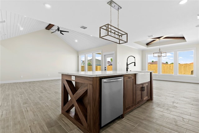 13942 Ketch St, Corpus Christi, TX 78418 - kitchen with stainless steel dishwasher, healthy amount of natural light, open floor plan, recessed lighting, and light countertops