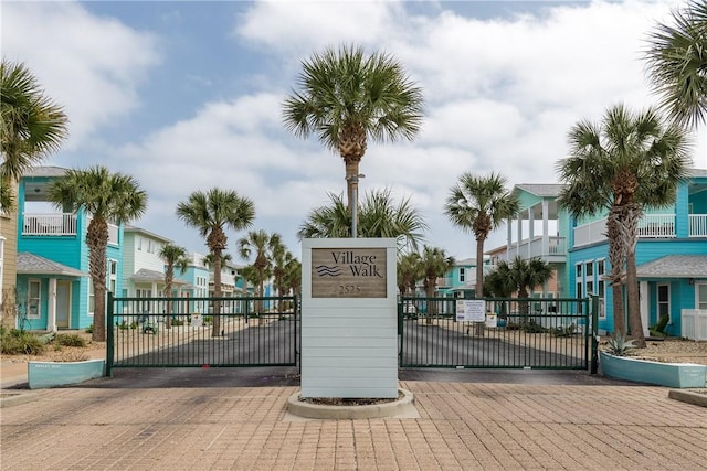 view of gate with a residential view