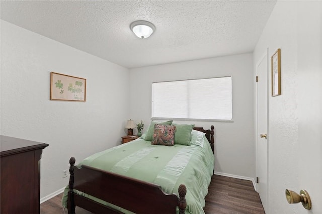 1313 E Cherrystone Dr, Corpus Christi, TX 78412 - bedroom featuring a textured ceiling and wood finished floors