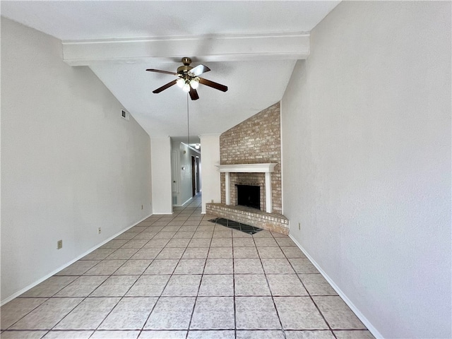 unfurnished living room with a fireplace, ceiling fan, vaulted ceiling, and light tile patterned floors