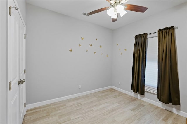 13950 Ketch St, Corpus Christi, TX 78418 - unfurnished room featuring light wood-type flooring, a ceiling fan, and baseboards