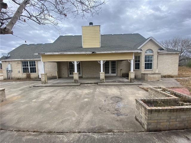 rear view of property with a patio