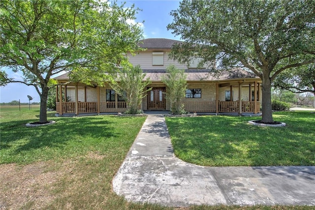 view of front facade with stone siding, a porch, and a front lawn