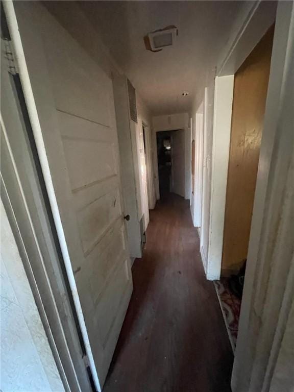 corridor with wood finished floors